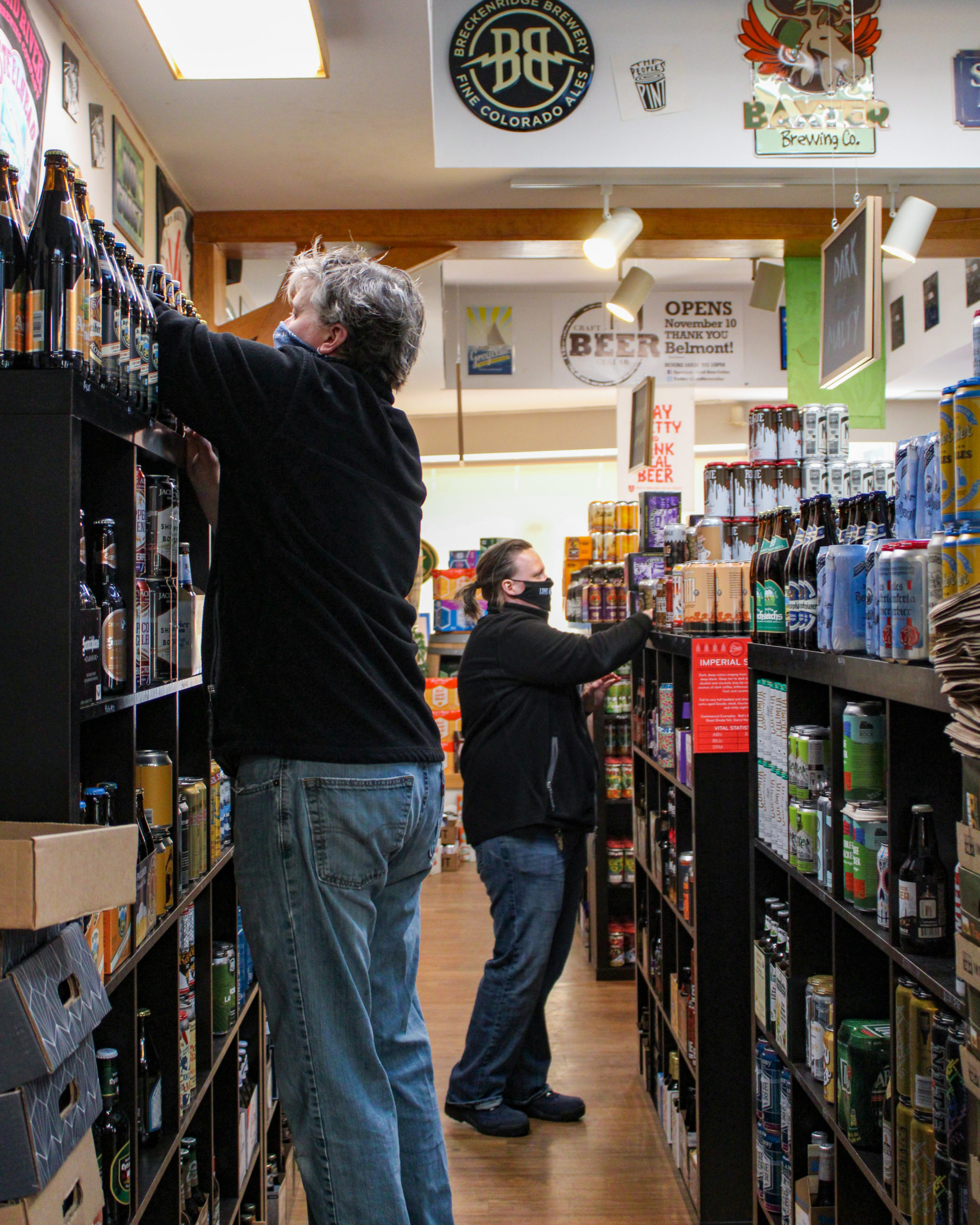 craft beer cellar stocking shelves