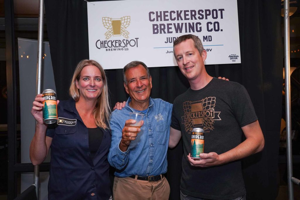checkerspot brewing co-founders judy and rob neff with boston beer co founder jim kock at the brewing the american dream beer bash