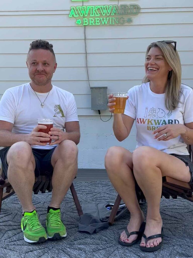 awkward brewing taproom manager harry stanley and co-founder amanda poliak 