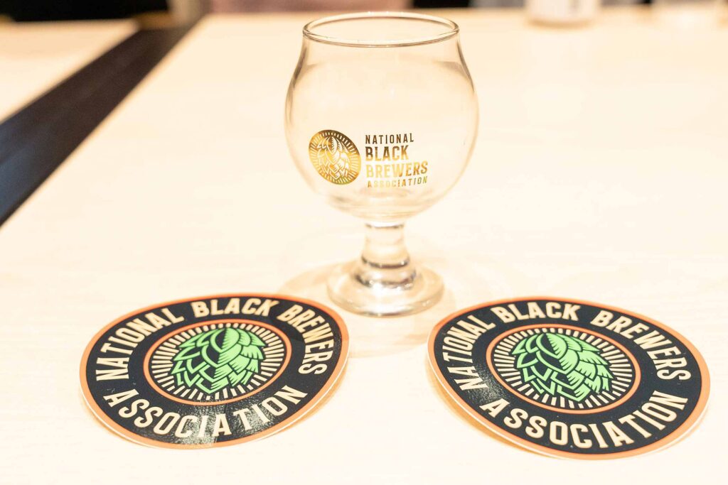 national black brewers association glass and stickers